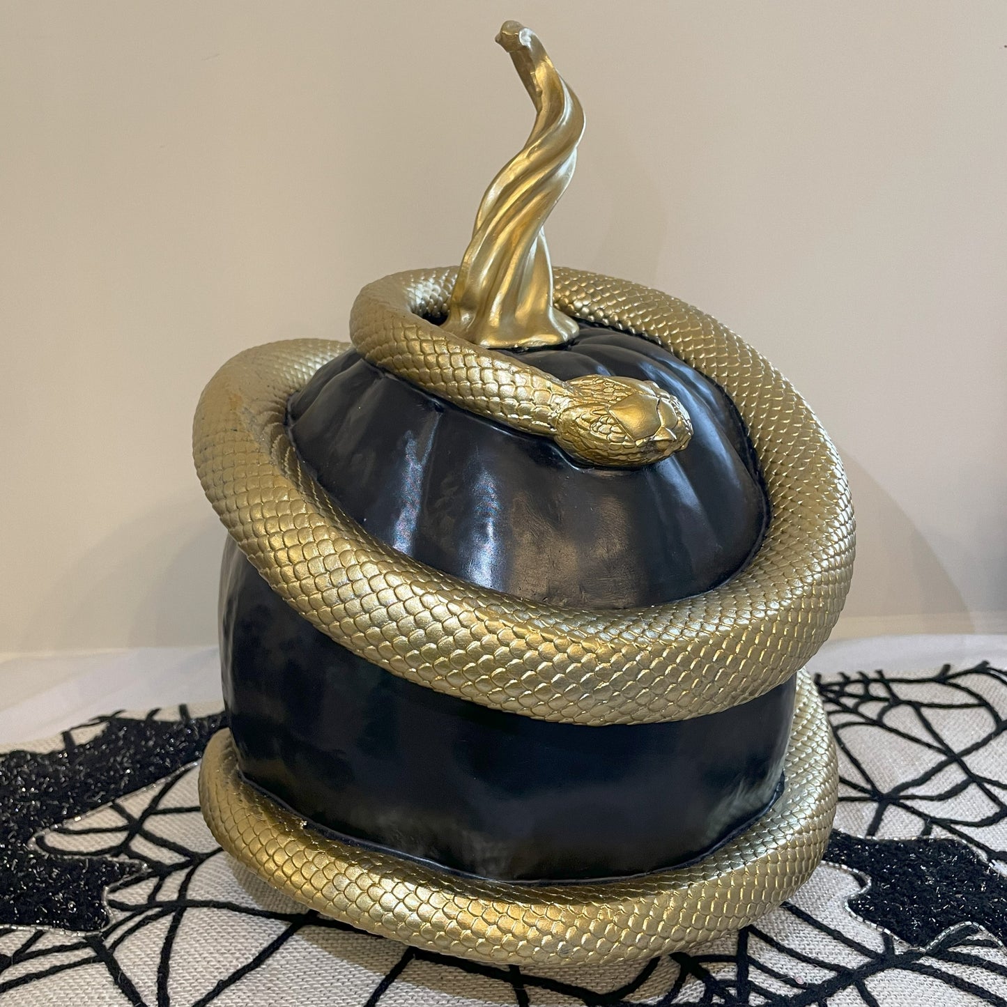 Black Pumpkin with Golden Snake